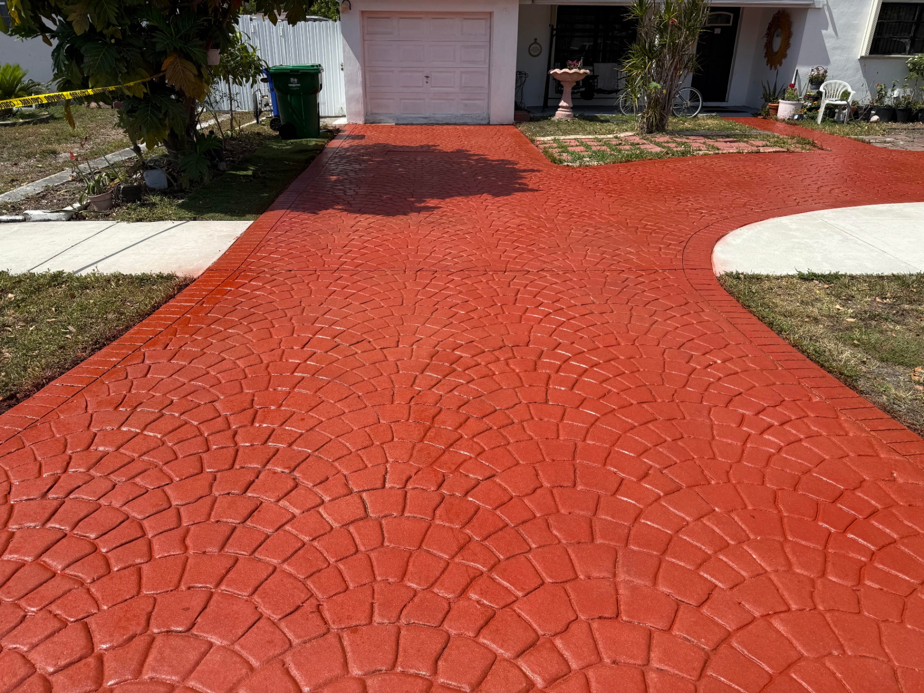 Professionally sealed paver and stamped concrete driveway